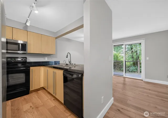 Photo 4 of Condo for sale at 11313 NE 128th Street #E104, Kirkland, WA 98034 | MLS# NWM2549119 | Listing updated on 2026-09-22