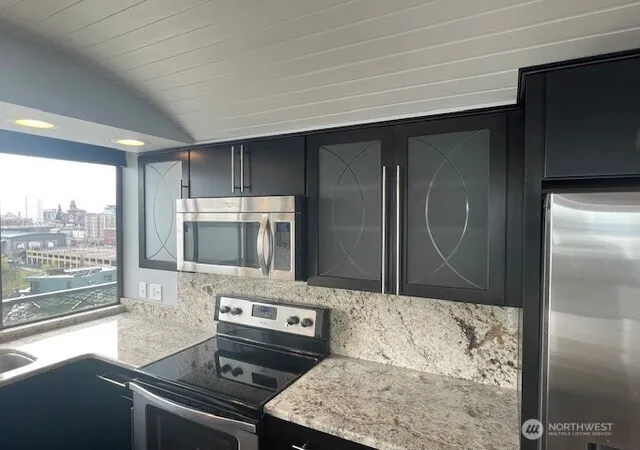 Photo 3 of Condo for sale at 404 N D St #11E, Tacoma, WA 98403 | MLS# NWM2549469 | Listing updated on 2026-09-22