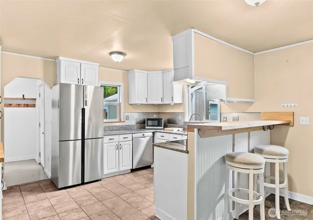Photo 3 of Single family home for sale at 504 G St SW, Tumwater, WA 98512 | MLS# NWM2549920 | Listing updated on 2026-09-22