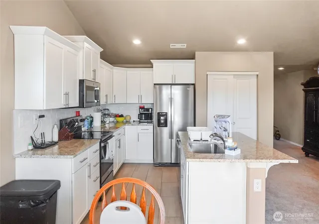 Photo 3 of Single family home for sale at 1125 W Sequoia Rd, Moses Lake, WA 98837 | MLS# NWM2550053 | Listing updated on 2026-09-22