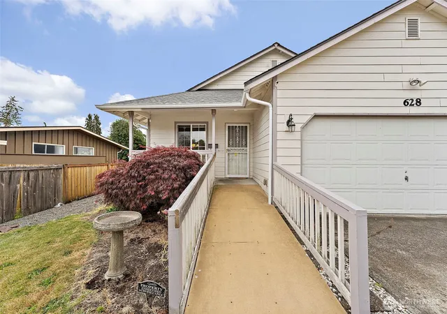 Photo 3 of Single Family Residence at 628 S 117th Street, Tacoma, WA 98444 | MLS# NWM2550314 | | Sold on 2026-10-01