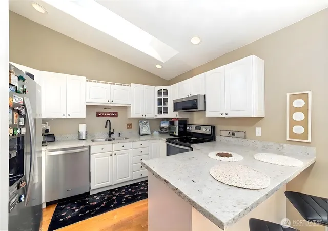 Photo 3 of Condo for sale at 2443 55th Avenue Sw #2A, Seattle, WA 98116 | MLS# NWM2551608 | Listing updated on 2026-09-22
