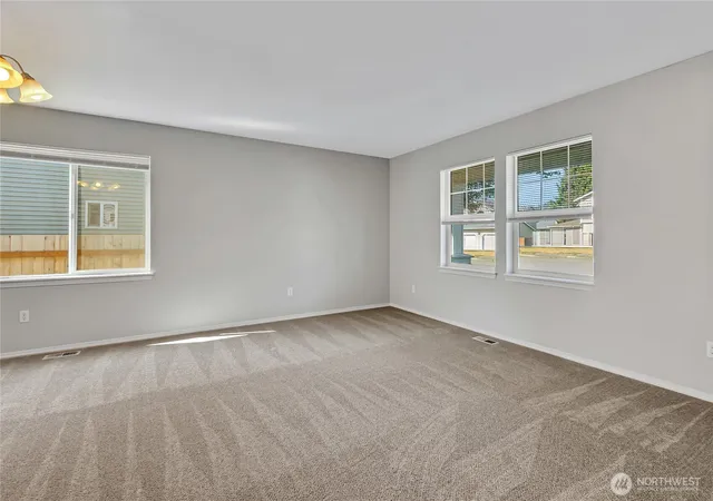 Photo 3 of Single family home for sale at 1401 Riddell Ave NE, Orting, WA 98360 | MLS# NWM2552064 | Listing updated on 2026-09-25