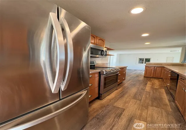 Photo 3 of Sale Pending at 12006 218th Avenue Ct E, Bonney Lake, WA 98391 | MLS# NWM2552684 | Listing updated on 2026-10-01