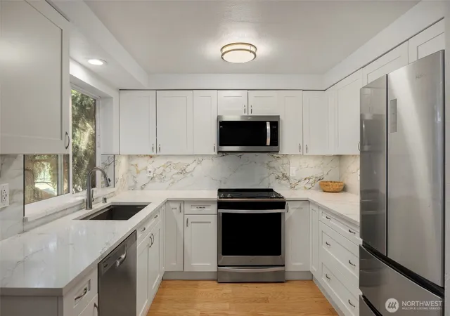 Photo 1 of Condo for sale at 4231 Ne 5th Street #B203, Renton, WA 98059 | MLS# NWM2553025 | Listing updated on 2026-09-22