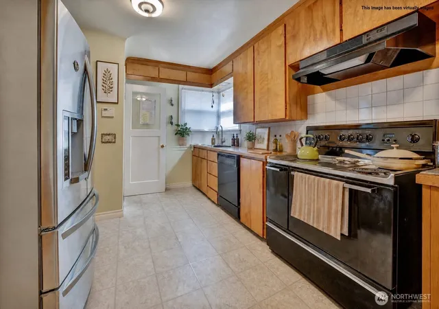Photo 3 of Single family home for sale at 2407 Larch Way, Lynnwood, WA 98036 | MLS# NWM2553556 | Listing updated on 2026-09-22