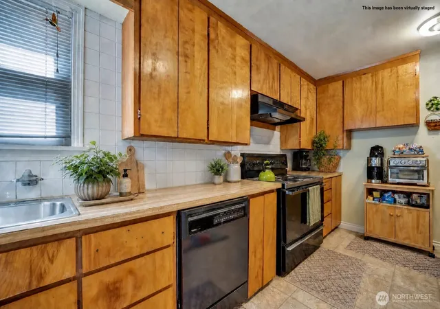 Photo 4 of Single family home for sale at 2407 Larch Way, Lynnwood, WA 98036 | MLS# NWM2553556 | Listing updated on 2026-09-22