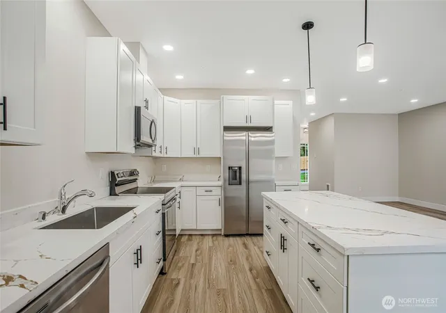 Photo 2 of Townhouse for sale at 1410 E 51st Street, Tacoma, WA 98404 | MLS# NWM2553765 | Listing updated on 2026-09-22