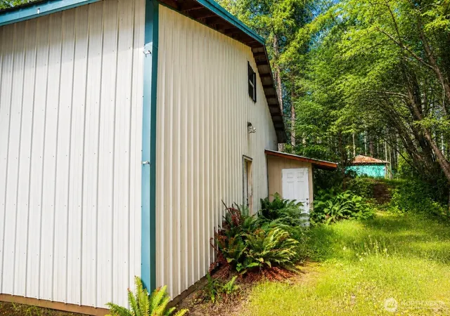Photo 3 of Single family home for sale at 511 NE Lakeshore Dr N, Tahuya, WA 98588 | MLS# NWM2554265 | Listing updated on 2026-09-22
