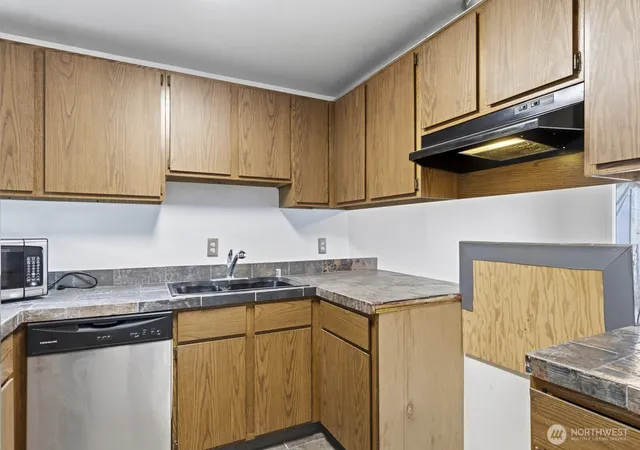 Photo 4 of Condo for sale at 4002 S 158th Street #F, Tukwila, WA 98188 | MLS# NWM2554881 | Listing updated on 2026-09-22