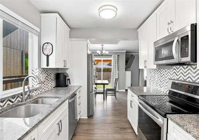 Photo 2 of Single family home for sale at 11719 9th Avenue Ct E, Tacoma, WA 98445 | MLS# NWM2555190 | Listing updated on 2026-09-22