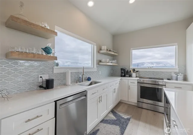 Photo 2 of Single family home for sale at 1038 Point Brown Ave Se, Ocean Shores, WA 98569 | MLS# NWM2555240 | Listing updated on 2026-09-22