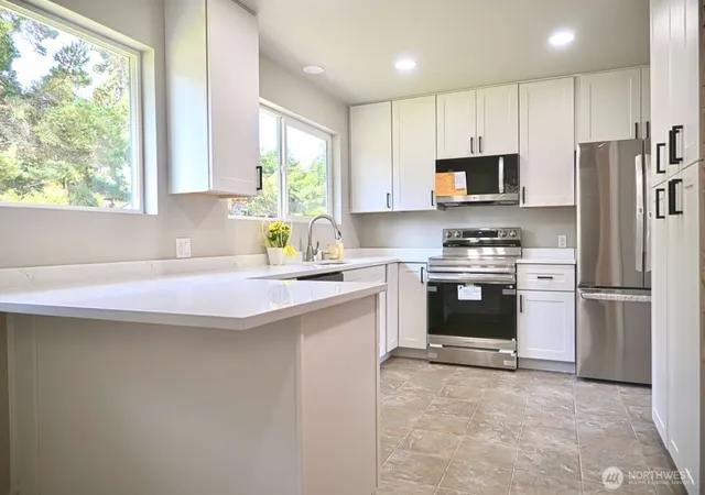 Photo 3 of Single family home for sale at 1012 Campbell Ave, Port Angeles, WA 98362 | MLS# NWM2555913 | Listing updated on 2026-09-21