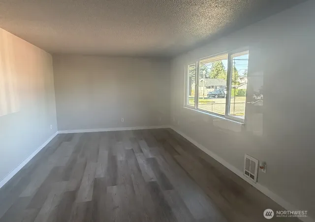 Photo 3 of Multi family home for sale at 404 S Division Ln, Tacoma, WA 98418 | MLS# NWM2556271 | Listing updated on 2026-09-22