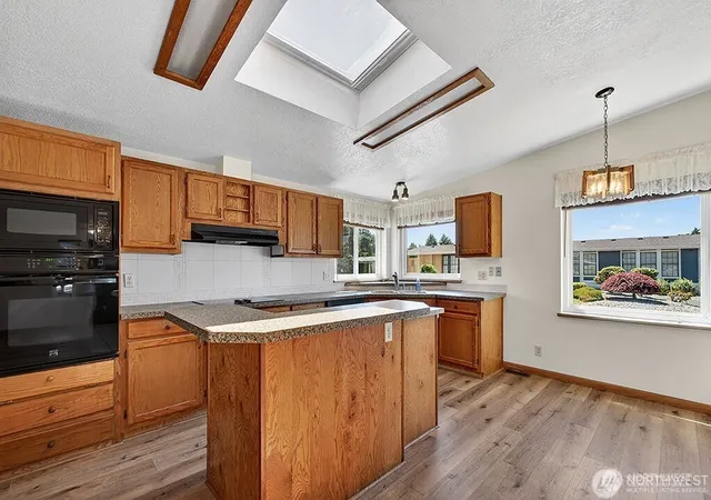 Photo 3 of Manufactured home for sale at 1402 22nd Street NE #546, Auburn, WA 98002 | MLS# NWM2557774 | Listing updated on 2026-09-23