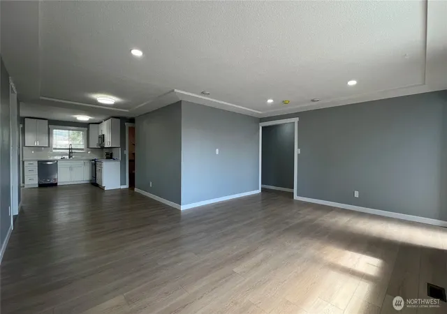Photo 4 of Single family home for sale at 7643 S Ainsworth Ave, Tacoma, WA 98408 | MLS# NWM2557892 | Listing updated on 2026-09-23