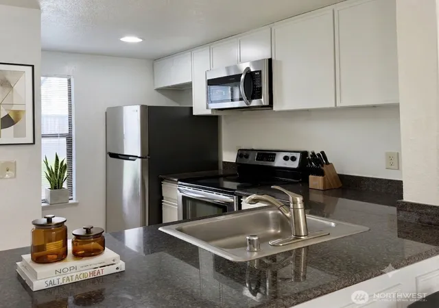 Photo 2 of Condo for sale at 8013 Ne 177th Court #403, Kenmore, WA 98028 | MLS# NWM2558126 | Listing updated on 2026-09-23