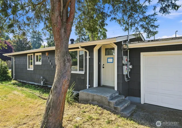 Photo 2 of Single family home for sale at 1402 Violet Meadow St S, Tacoma, WA 98444 | MLS# NWM2558381 | Listing updated on 2026-09-23