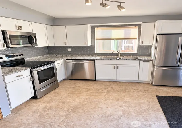 Photo 2 of Single family home for sale at 412 Mckenzie Ave Sw, Yelm, WA 98597 | MLS# NWM2559110 | Listing updated on 2026-10-20