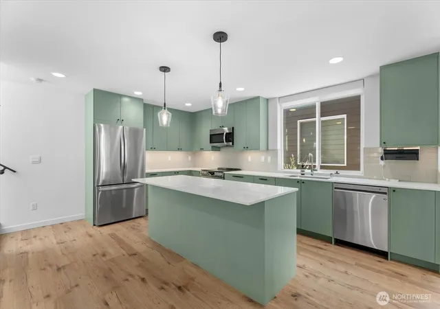 Photo 3 of Condo for sale at 11824 31st Place Ne, Seattle, WA 98125 | MLS# NWM2559695 | Listing updated on 2026-09-23