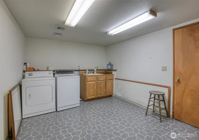 Photo 3 of Single family home for sale at 1497 E Ocean Shrs Blvd SW, Ocean Shores, WA 98569 | MLS# NWM2560434 | Listing updated on 2026-09-23