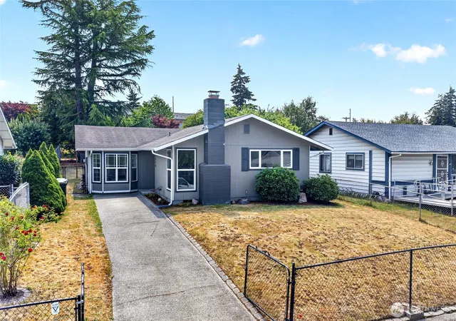 Photo 2 of Single family home for sale at 1318 E 62nd Street, Tacoma, WA 98404 | MLS# NWM2561168 | Listing updated on 2026-09-24