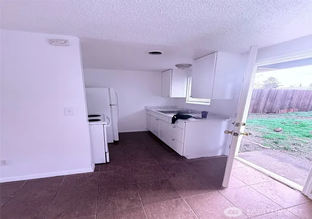 Photo 3 of Single family home for sale at 1644 120th Street S, Tacoma, WA 98444 | MLS# NWM2561244 | Listing updated on 2026-09-23