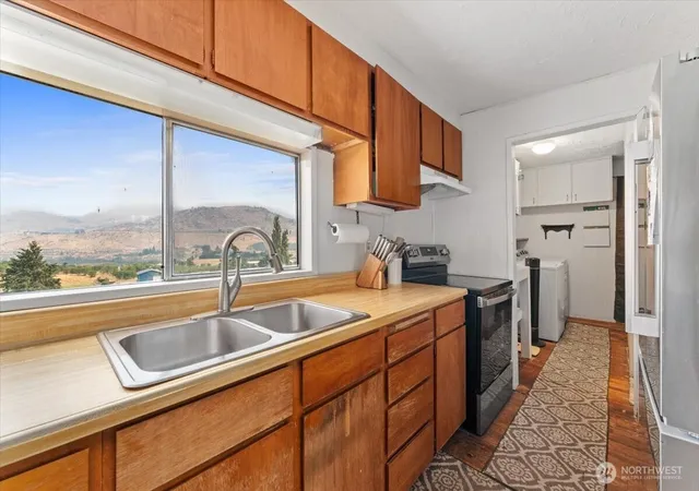 Photo 3 of Single family home for sale at 1638 Green Ave, Manson, WA 98831 | MLS# NWM2561313 | Listing updated on 2026-09-24
