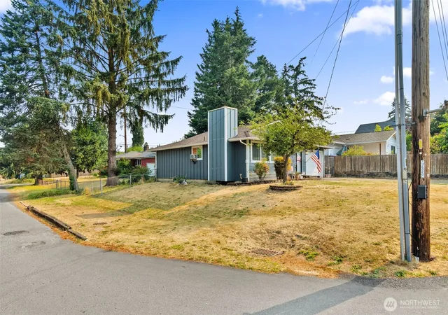 Photo 3 of Single family home for sale at 401 E 66th Street, Tacoma, WA 98404 | MLS# NWM2561434 | Listing updated on 2026-09-23