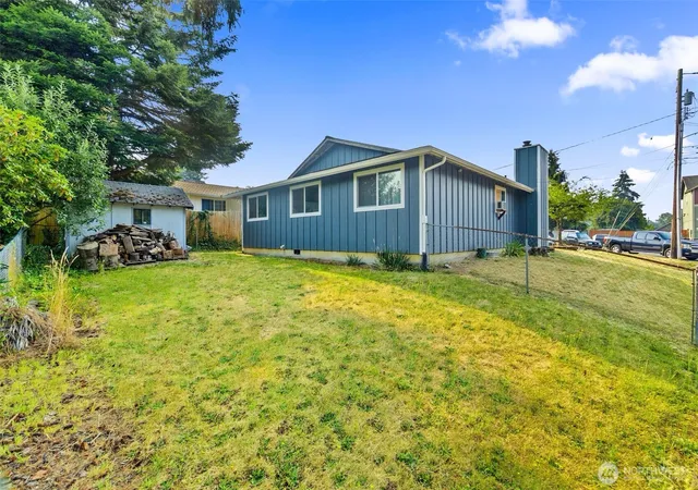 Photo 3 of Single family home for sale at 401 E 66th Street, Tacoma, WA 98404 | MLS# NWM2561434 | Listing updated on 2026-09-23