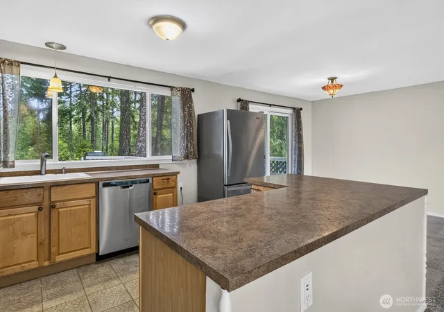 Photo 3 of Sale Pending at 591 E Country Clb Dr, Union, WA 98592 | MLS# NWM2561700 | Listing updated on 2026-09-25