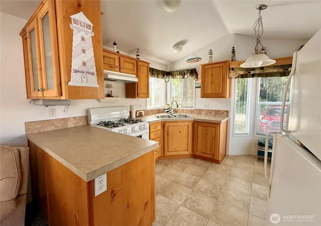 Photo 4 of Manufactured home for sale at 881 Magellan Ave NE, Ocean Shores, WA 98569 | MLS# NWM2563136 | Listing updated on 2026-09-23