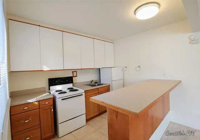 Photo 2 of Multi family home for sale at 6537 Oswego Pl NE, Seattle, WA 98115 | MLS# NWM2563692 | Listing updated on 2026-09-23
