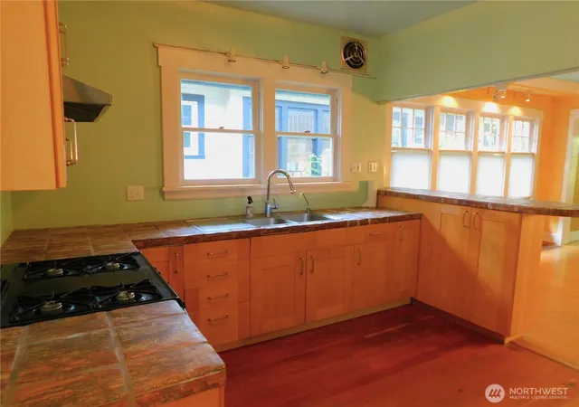 Photo 4 of Single family home for sale at 7217 4th Avenue NW, Seattle, WA 98117 | MLS# NWM2564193 | Listing updated on 2026-09-23