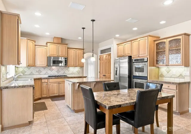 Photo 4 of Single family home for sale at 2413 12th Avenue NW, Puyallup, WA 98371 | MLS# NWM2565709 | Listing updated on 2026-09-23
