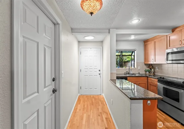 Photo 3 of Sale Pending at 5527 Bridgeport Way W #C, University Place, WA 98467 | MLS# NWM2565855 | Listing updated on 2026-09-25