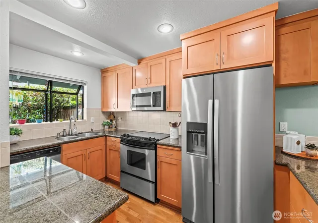 Photo 4 of Sale Pending at 5527 Bridgeport Way W #C, University Place, WA 98467 | MLS# NWM2565855 | Listing updated on 2026-09-25