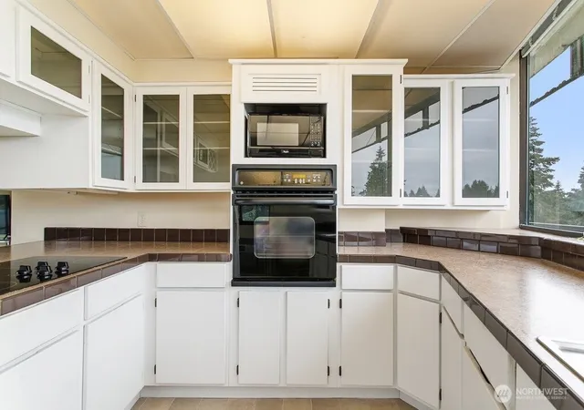 Photo 3 of Condo for sale at 1910 Evergreen Park Dr SW #701, Olympia, WA 98502 | MLS# NWM2566165 | Listing updated on 2026-09-23