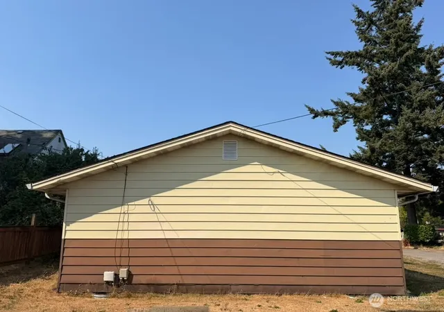 Photo 3 of Single family home for sale at 214 South 52nd St, Tacoma, WA 98408 | MLS# NWM2566198 | Listing updated on 2026-09-25