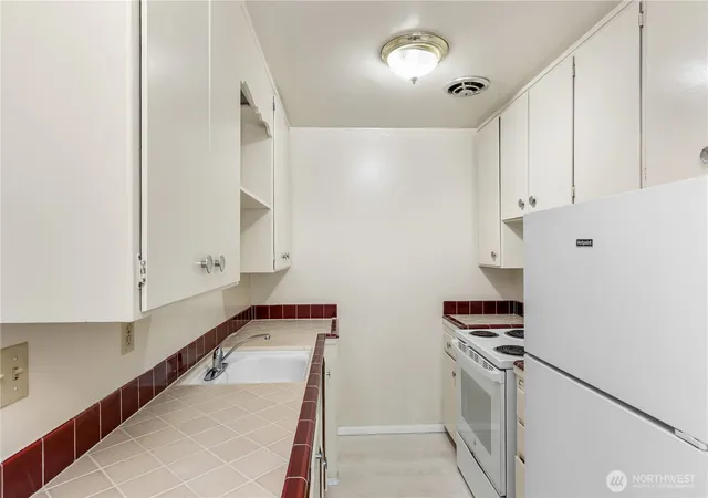 Photo 3 of Multi family home for sale at 2600 NE 125th Street, Seattle, WA 98125 | MLS# NWM2567385 | Listing updated on 2026-09-23