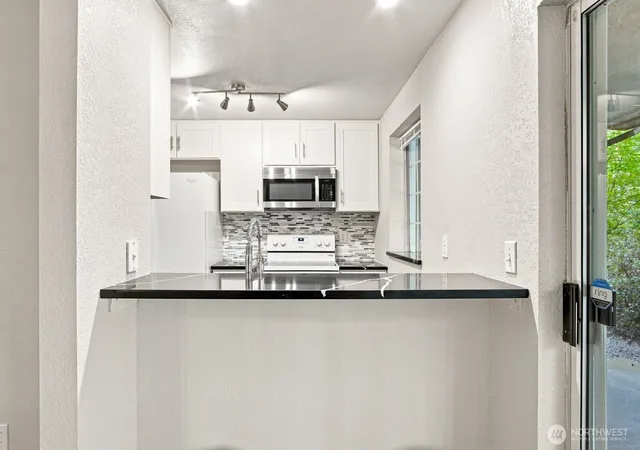 Photo 4 of Condo for sale at 15433 Country Clb Dr #E103, Mill Creek, WA 98012 | MLS# NWM2567847 | Listing updated on 2026-10-02