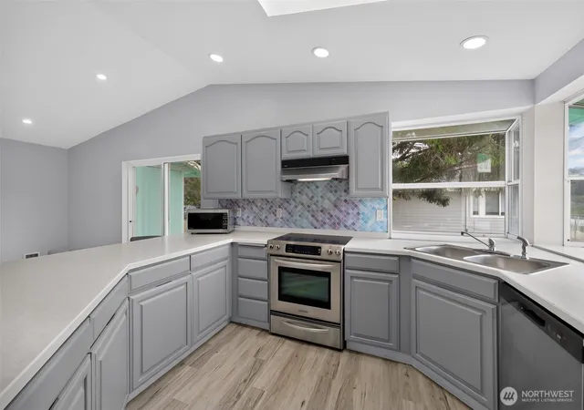 Photo 3 of Single family home for sale at 393 Canal Dr SE, Ocean Shores, WA 98569 | MLS# NWM2568756 | Listing updated on 2026-09-24