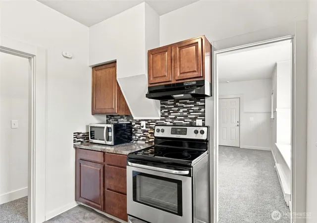 Photo 4 of Single family home for sale at 4814 S Yakima Ave, Tacoma, WA 98408 | MLS# NWM2569089 | Listing updated on 2026-09-23
