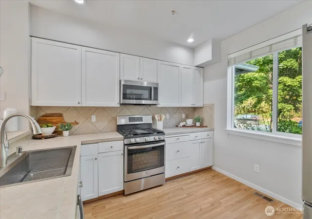 Photo 3 of Townhouse for sale at 10901 124th Avenue NE #2-4, Kirkland, WA 98033 | MLS# NWM2569297 | Listing updated on 2026-09-30