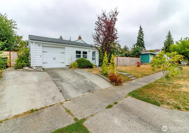 Photo 2 of Single family home for sale at 1005 E 57th Street, Tacoma, WA 98404 | MLS# NWM2569404 | Listing updated on 2026-09-23