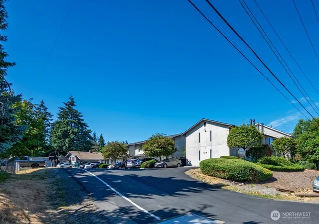 Photo 3 of Multi family home for sale at 1031 SW 1045 122nd Street, Seattle, WA 98146 | MLS# NWM2569544 | Listing updated on 2026-09-23