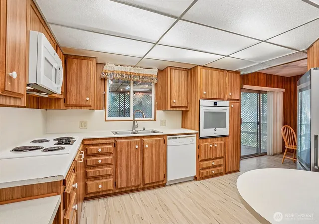 Photo 3 of Manufactured home for sale at 10414 Peacock Hl Ave #50, Gig Harbor, WA 98332 | MLS# NWM2569824 | Listing updated on 2026-09-27