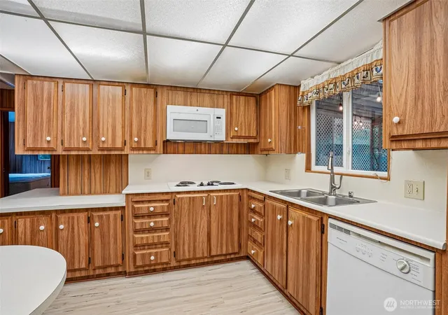 Photo 4 of Manufactured home for sale at 10414 Peacock Hl Ave #50, Gig Harbor, WA 98332 | MLS# NWM2569824 | Listing updated on 2026-09-27