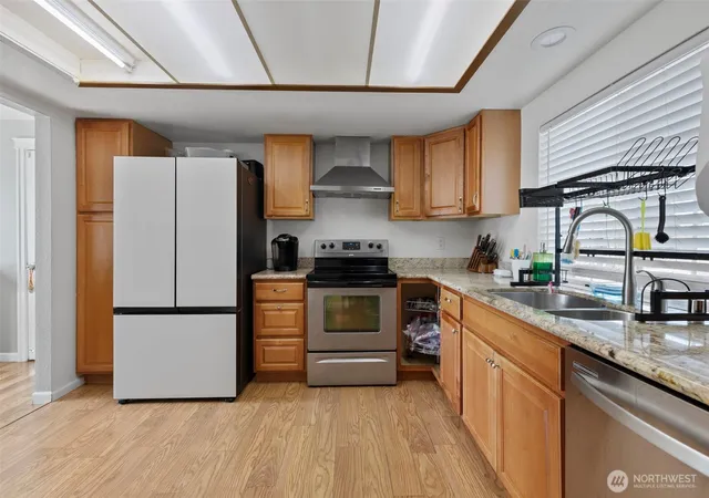 Photo 3 of Single family home for sale at 10319 SE 228th Street, Kent, WA 98031 | MLS# NWM2570749 | Listing updated on 2026-09-23