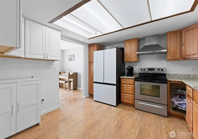 Photo 4 of Single family home for sale at 10319 SE 228th Street, Kent, WA 98031 | MLS# NWM2570749 | Listing updated on 2026-09-23